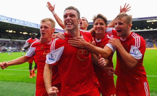 英超最新积分榜：枪手登顶蓝军翻车，利物浦失分争冠格局再洗牌（英超积分新态势：阿森纳领跑、切尔西爆冷，利物浦丢分争冠再生变数）